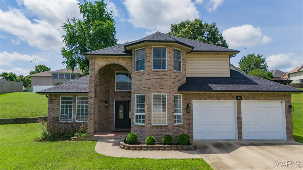 Welcome home to this stunning two-story, 3-bedroom, 2.5 bathroom residence in Waynesville! From the moment you step inside, you'll be greeted by a grand entryway featuring a beautiful staircase that sets the tone for this elegant home. The main level offers a dedicated library or home office, a spacious living room, a formal dining room, and a well-appointed kitchen complete with a center island, perfect for meal prep and entertaining. A convenient half bath and laundry room complete the main floor. Upstairs, retreat to the spacious primary suite featuring a luxurious ensuite bathroom with a double vanity, jetted soaking tub, separate shower, and a large walk-in closet. Two generously sized guest bedrooms share a convenient Jack-and-Jill bathroom, providing both comfort and privacy. With its thoughtful layout and timeless appeal, this exceptional home is one you won't want to miss. Schedule your private tour today!