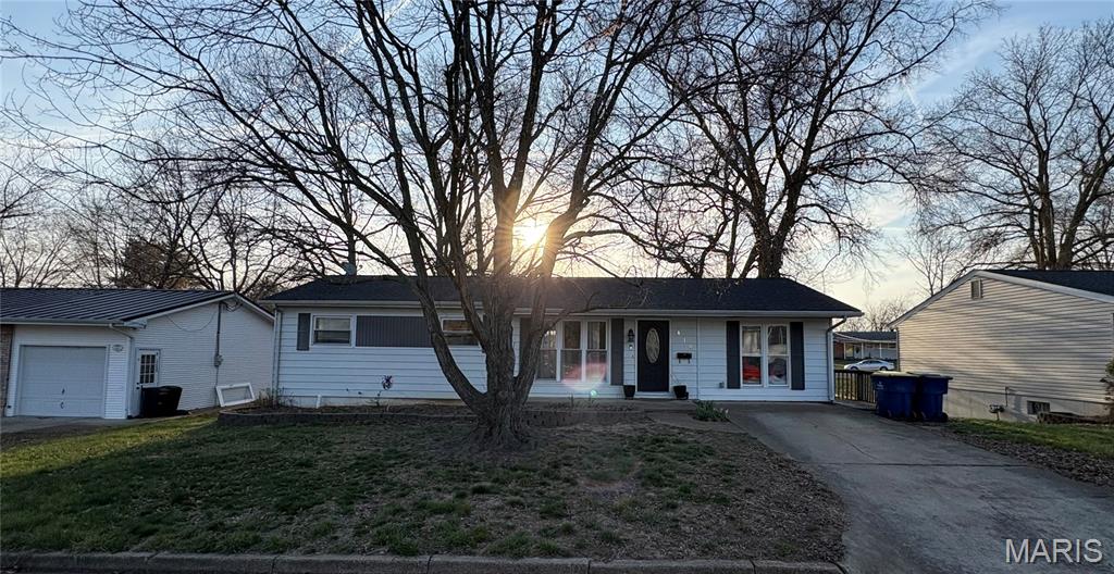 IF opportunity knocked, would you answer the door? Check out thee possibilities for this 3/2 ranch style home with a potential 4 bedroom (formerly the garage), main floor laundry, large back deck, full basement (possible 3rd bath) that walks out to a concrete patio and a second lot that makes for a huge backyard. 
Bring your hammock and grill, picnic table and riding mower unless you want to stay in shape push-mowing the yard that goes uphill both ways. Need more space to put things? Take a peak in the storage shed, see if it can save you money. Don't let the pictures fool you, it will need some work to get a few things back into shape, but nothing a strong back and long weekend won't fix. If you don't mind having a little to-do list, then this one is practically move-in-ready. The good news is that you get to choose, so check your schedule and book your showing today!