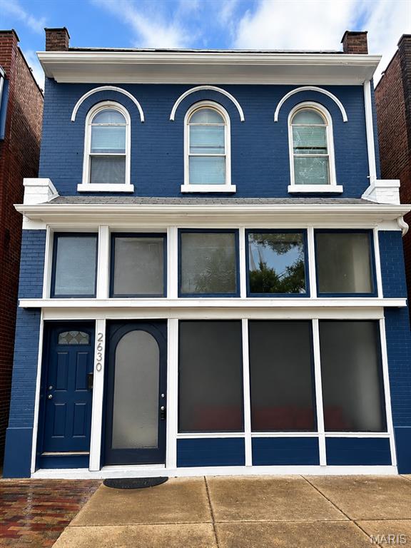 Welcome to a truly unique mixed-use opportunity in the heart of St. Louis—perfect for those looking to live, work, play, and stay all in one place.

This historic Italianate-style brick building blends character with versatility. The upper level features a spacious 3-bedroom, 1-bath residential unit filled with natural light and classic architectural charm, including arched windows and timeless details.

The lower level offers a one-of-a-kind studio-style space with a full bathroom, ideal for a home office, creative studio, small business storefront, or additional living/lounge area. The flexible layout allows you to customize the space to fit your lifestyle or income-producing needs.

Additional highlights include a 2-car garage, providing convenient off-street parking—a rare find in the area.

Whether you're an entrepreneur, investor, or homeowner seeking a live/work setup, this property delivers unmatched potential. Even better, this property may qualify for up to $50,000 in down payment assistance through SLDC programs, making ownership more accessible than ever.

Don’t miss your chance to own a versatile property with endless possibilities in a prime St. Louis location!