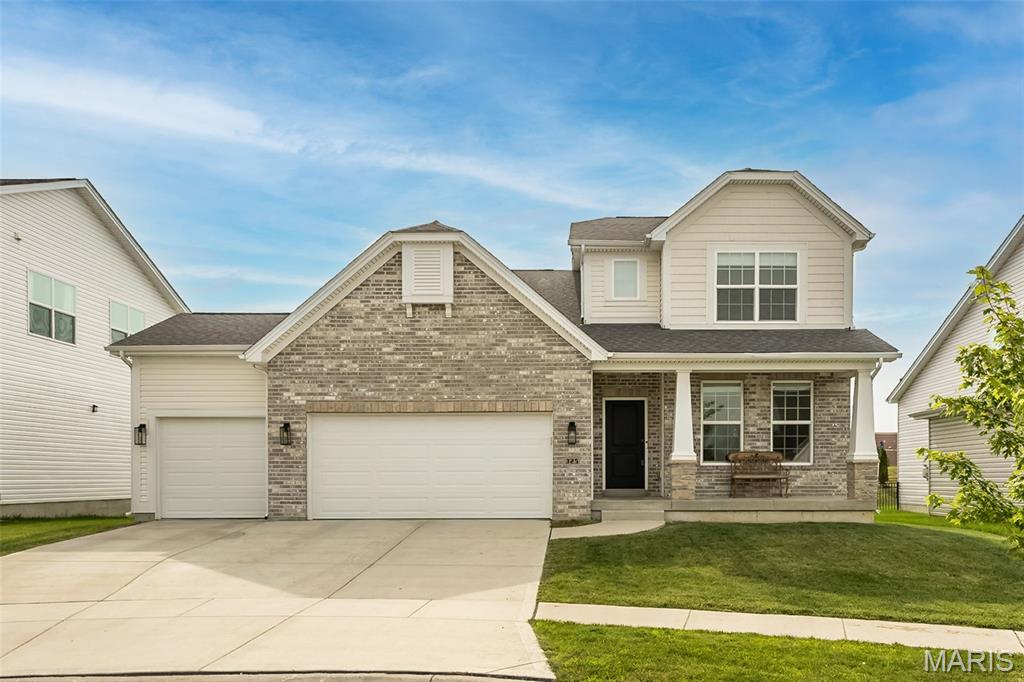 Better than new—this stunning 1.5-story home offers all the upgrades and features of the display home and more! From the moment you arrive on a premium cul-de-sac lot with a 3-car garage, you’ll notice the quality and attention to detail that make this home stand out. Step inside to a bright, spacious main level updated with 9-ft ceilings throughout and soaring 11-ft ceilings in the Kitchen, Breakfast Room, & Great Room. Luxury vinyl plank flooring runs through the living area, complemented by recessed lighting for a clean, modern feel. The kitchen is a showstopper with upgraded 42” white cabinetry, sleek black hardware, a large island with breakfast bar, stainless steel appliances, a convenient coffee bar, and a walk-in pantry—perfect for everyday living and entertaining. The Dining Room features doors installed and can easily be used as a home office or flex space. Retreat to the spacious primary bedroom with an ensuite luxury bath, including a separate tub and shower, double vanities, and a generous walk-in closet for ultimate comfort and convenience. Upstairs, you’ll find three additional bedrooms and two full bathrooms, including an ensuite in Bedroom 4—ideal for family, guests, or multi-generational living. Downstairs, the lower level was professionally finished and offers a full bathroom, a bedroom, a rec room, and a wet/dry bar—plus plenty of storage space to keep everything organized. Outside, enjoy the beautifully finished backyard with a covered patio and an additional patio with retaining wall—an ideal setup for relaxing, grilling, and hosting. This is the one—move in and start living your best life. Book your private showing today!