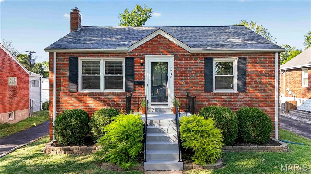 There’s a lot to love about this classic brick bungalow, especially when you add up the location, the updates, and the easy livability. Set on a quiet one-way street in Richmond Heights, 7737 St. Albans is just minutes from a major shopping center and downtown Clayton, yet feels comfortably tucked away.
Inside, the main living spaces have an inviting flow, with the living room opening naturally to the dining room and kitchen. Hardwood floors, abundant windows, a neutral palette, and arched openings give the home an airy feel with just the right amount of character.
The kitchen has been thoughtfully improved with a 5-burner gas range, 42-inch cabinets, newer SS appliances, and a generous pantry. The refrigerator AND washer/dryer stay, too. A new dining room chandelier adds a nice finishing touch, while ceiling fans throughout add comfort.
Downstairs, the basement offers surprisingly good storage with built-in shelving and closets.
And then there’s the garage. A large, detached 2-car garage is an unusual find at this price point and gives you something that’s increasingly hard to come by: room for TWO cars, and space for bikes, tools, etc. The partially fenced yard with tasteful landscaping adds even more flexibility.
With a comfortable open flow, thoughtful improvements, excellent storage, and a location that puts Clayton, and nearby shopping and amenities within easy reach, 7737 St. Albans is a bungalow that makes everyday living easy peasy!