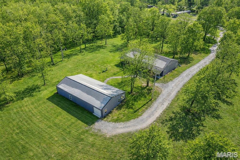 Unique opportunity on approximately 16.24 acres with Highway 17 road frontage just north of Crocker. This spacious 3,600 m/l sq ft home offers 4 bedrooms, 2 full baths, and a flexible floor plan with room to grow. The structure and vision are here, it simply needs the right buyer to bring it to completion and make it their own.

The acreage provides a blend of open ground and wooded areas with endless potential for recreation, farming, or investment use. 5 RV hookups add versatility for guests, extended stays, or future income possibilities. An additional 2,160 m/l sq ft matching-style structure offers even more opportunity and could be finished as living quarters, workshop space, or a business venture.

Whether you're envisioning a homestead, retreat-style property, income-producing setup, or simply room to spread out, this property offers the space and foundation to make it happen. Bring your ideas and finish it to match your vision. 

Measurements are approximate.
