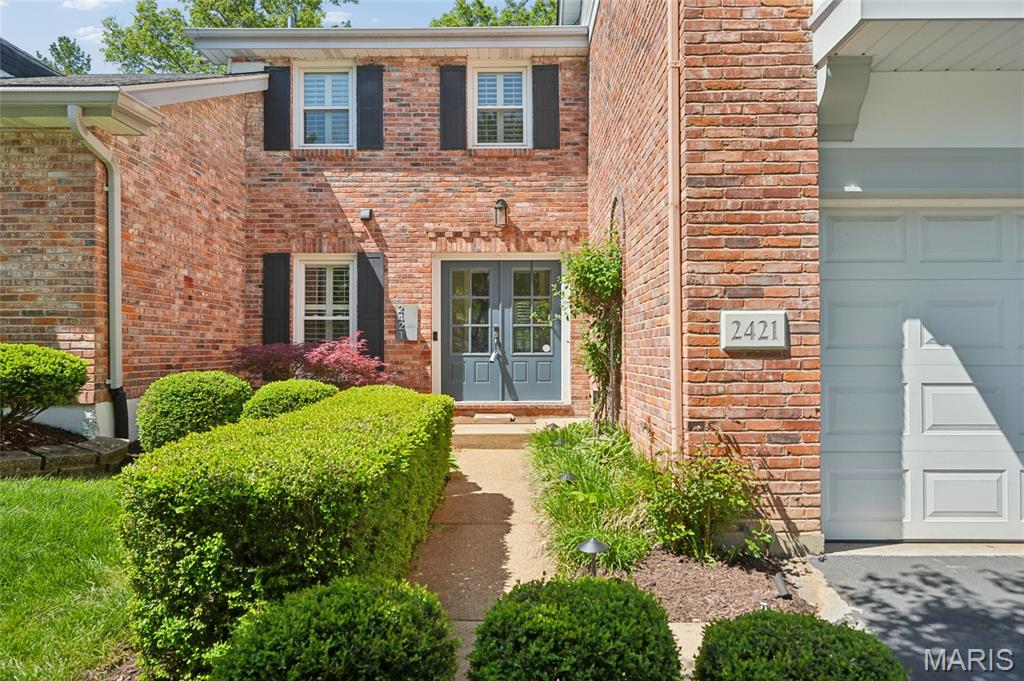 Move-in ready end-unit villa featuring a private, landscaped patio backing to common ground and mature trees. The foyer opens to a spacious great room with vaulted ceilings, fireplace, and built-in shelving, adjacent to a dining area ideal for everyday living or entertaining. The updated kitchen offers a center island, quartz countertops, subway tile backsplash, pantry, and stainless steel appliances.
The primary suite includes a walk-in closet with built-ins, an updated full bath, and an additional laundry hookup option conveniently located near the primary bedroom. Two additional bedrooms and a second updated full bath complete the upper level.
The finished lower level features a newly completed basement with updated flooring, ceiling, paint, stair carpet, and a fully renovated laundry room, plus additional living space, storage, and a wine closet. Additional highlights include wood flooring, plantation shutters, updated lighting, an updated powder room, and a secondary laundry hookup on the main level.
Community amenities include a clubhouse, pool, pickleball courts within walking distance, and beautifully maintained common grounds. Conveniently located near shopping, dining, and major highways.