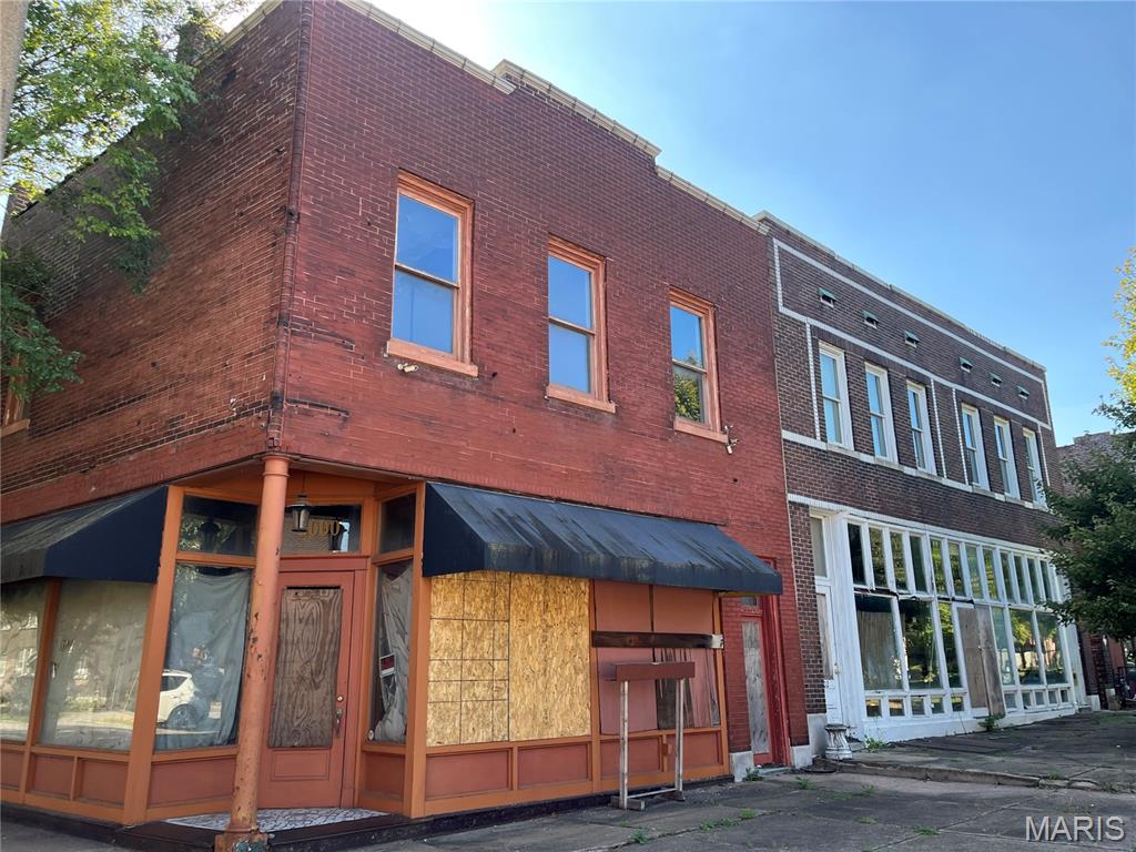 WoW Opportunity is knocking the door down!  Sold As Is!  One apartment upstairs 2 bedrooms.  Structural damage at the back of the building from roof to the basement this is not for the weekend warrior.  Great Tax credit project!  Build what you want great cafe, internet business and live upstairs, antique shop, yoga studio, hair salon, ice cream shop, wine bar, bike shop accounting firm, endless possibilities.  make this one big single family home, 2 apartments, slice it up into mini rentals...