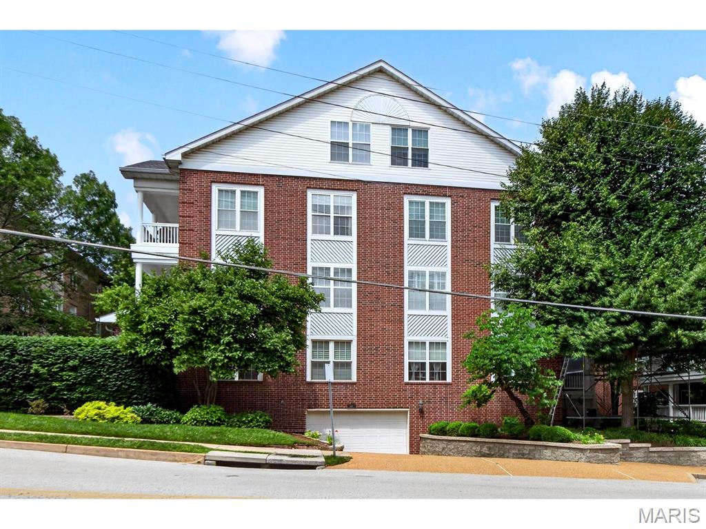 This sophisticated home has been well cared for and it shows. The spacious living room has subtle lighting and walks out to a quaint balcony.  The kitchen is current, with updated stainless steel appliances (2019), a pantry, built-in desk, and an island finish off the space.  The breakfast room fits a nice size table for dining and leads to another private balcony -  yes! this unit has TWO balconies. There is laundry inside unit, include washer and dryer (June 2021). Carpet in living room and hallway installed summer of 2024.  The primary bedroom is spacious and offers a deep walk-in closet and a generously sized master bath with separate shower, large soaking tub, and two vanities (one for each of you). Primary bedroom also has a door to the balcony. The second bedroom is roomy, comfortable and private- nice for when you have out of town guests. Two Assigned Parking Spaces. Secure entrance to building. Elevator.   Basement storage unit, marked 2C. Close to restaurants and shopping!   **This cozy oasis gives you so many options.**