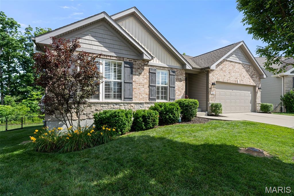 Attractive, very well maintained ranch home with a fabulous finished walk-out lower level. This beauty is so much bigger than she appears. The main floor living is a gorgeous open space featuring; a vaulted great room with stone, gas burning fireplace, dining area that opens to a large deck overlooking the natural landscape and woods, plus a gorgeous eat-in kitchen. The kitchen is highlighted by a large center island, granite counters, 42 inch cabinets, and stainless appliances. The first floor primary suite includes a large bath with double sinks, separate tub and shower and large walk-in closet. There are two additional bedrooms, plus a full bath on the main level. The lower level is host to a family room that opens to a lovely rear patio and fenced yard, plus two additional good sized bedrooms, a full bath and extensive storage space. Other features of this beauty; main floor laundry, walk-in pantry, attached two car garage, plus a corner lot on a cul-de-sac.