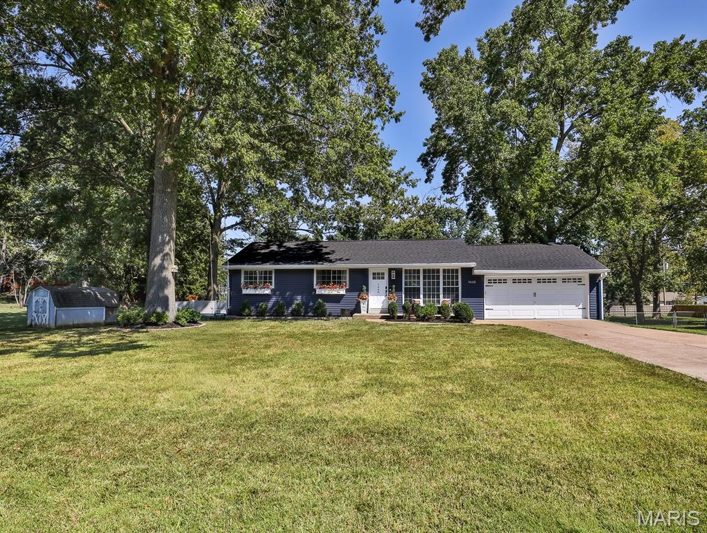 Ellisville Elementary, Crestview Middle, Lafayette HS
4 Bedroom / 2 Full Bath Ranch with a level, vinyl 6' privacy fence,  .49 acre yard that is absolutely beautiful! Walking distance from Ellisville Elementary. Occupancy has already passed.  This is the most adorable home! 2021 all new siding ...  roof is 5 years young, new HVAC, composite deck, fire pit in the backyard. The kitchen is beautiful! Updated ~ 42"  white cabinets, Corian center island, stainless steel appliances, large sink with new faucet, white subway tile backsplash. The fridge will stay ( purchase in 2023) .  The kitchen has a huge pantry!!  3 bedrooms on the main floor. The entire main floor has hardwood flooring. The finished lower level has the second full bathroom as well as a large 4th bedroom. There is a family room, storage and a nice laundry area in the lower level. The washer and dryer will stay. This home is a walkout. The backyard is stunning... almost a 1/2 acre lot, level and a shed in the back that stays as well as a fire pit area.  So much to love!!