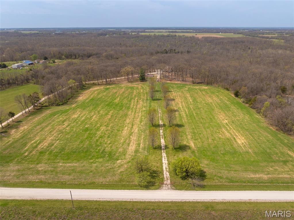 Very hard to find in Warren county, open and flat land that is unrestricted! This 10+- acres will be divided off of a larger 14 acre tract, it is going to be done before closing. This will change the legal description, the tax amount and the size will be approximately 10 acres, 690 x 630. Imagine what you can do here, build a dream home, split it into smaller lots of 3+ acres, or perhaps 2 homesites of 5 acres each. There is a fence around most of the property with a red gate in the front. A gravel driveway is roughly down the middle. It has been planted in wheat for the past few years but is currently unplanted. This is on Pin Oak church road. It's worth checking out just for the scenic drive itself! About 6 miles north of highway 70. Please reach out if you have any questions on this beautiful tract of land.