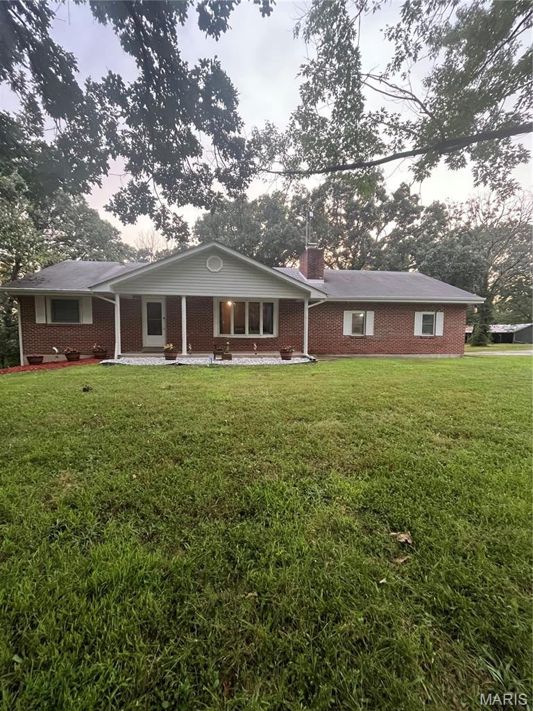 15 miles from I-44... Beautiful Turnkey 20 Acre Farm ready for your cattle, horses or any kind of livestock.....  (26.35 additional acres also available with U HWY blacktop road frontage and stocked pond (crappie, bass, perch), call for more information).  Quaint brick home with unfinished walk-out basement ready for your personal design to fit your family's needs, as well as an attached 2 car garage.  Featuring 20 acres of fenced pasture and wooded land, automatic water feeder, stocked pond (catfish, bass, perch), barn with electric, and chicken coop.  

**Ask how this property may qualify for USDA 0% down or VA financing for qualified buyers, contact for more details**   573-263-4799, Jodi Cook, NettWork Global.**


Brick home on a full walkout basement, offering a large deck from the dining room, a patio from the walk-out basement with a hot tub to a fenced back yard and a covered front porch with a beautiful bay window.  Recently re-finished hardwood floors which are throughout most of the home.  2 bedrooms and 2 bathrooms on main level. The basement was being used as an additional bedroom and is plumbed to easily add a bathroom, leaving plenty of room to complete another bedroom and a family room or game room as well.  Home comes with the remaining transferable warranty on the furnace and ac unit.  The heating and air system has a Wi-Fi Smart Thermostat giving you control of the temperature while away from home.
Additional structures include a barn with electric, chicken coop, pig pen behind barn and a two-story 1800s home with working electric, ideal for restoration or storage (roof repair needed).  Ride your horse or drive your side-by-side and four wheelers to the  Bourbeuse River just minutes away....   Don't miss this one!!  Call today to schedule your tour, 573-263-4799, Jodi Cook, NettWork Global.