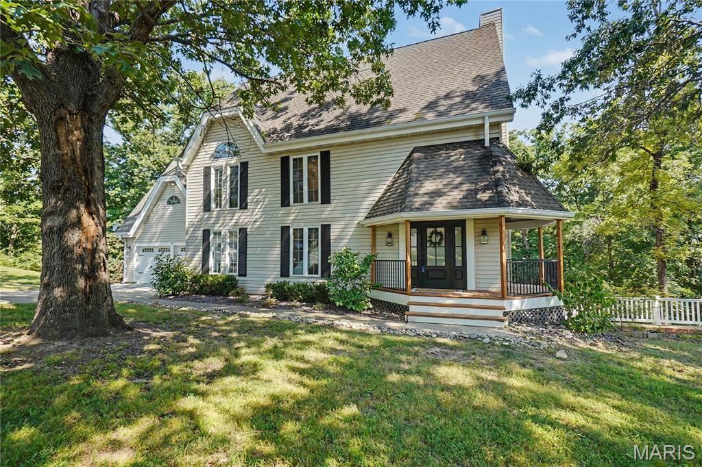 Nestled on 3.5 acres in Lake Saint Louis, this beautifully reimagined estate offers an exceptional combination of luxury, privacy, water access potential, and resort-style amenities. Peruque Creek runs behind the home and connects into Lake Saint Louis, providing the opportunity to create backyard access for launching a canoe or kayak. Larger boats may be launched from the community marinas. Thoughtfully remodeled with elevated finishes and refined design throughout, the home features multiple sunrooms, peaceful water views, an entertainer-friendly layout, and a spacious finished walkout lower level offering flexibility for everyday living, guests, and gatherings. The property is part of the Lake Saint Louis Community Association and includes full lake rights, along with access to golf, pools, tennis, pickleball, fitness facilities, beaches, marinas, and boat-slip rentals. This rare combination of acreage, privacy, and Lake Saint Louis amenities offers a truly one-of-a-kind lifestyle. Visit www.LSLCA.com for community amenities and association documents.