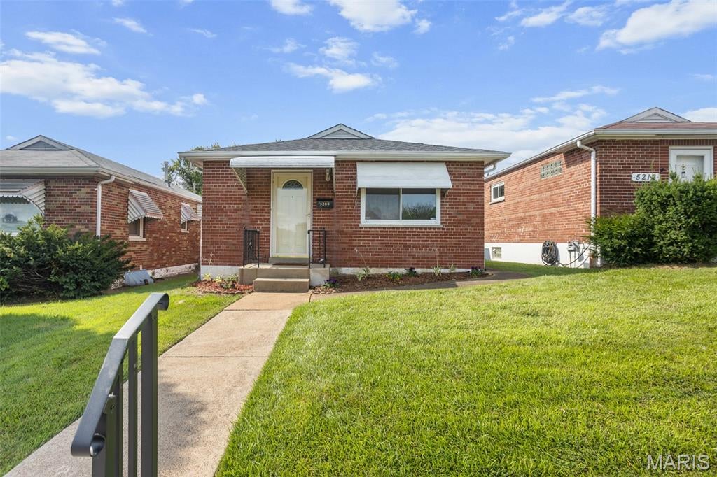 Step into this classic South City1955 brick bungalow featuring 2 bedrooms, 1 bath, and main-level laundry for everyday ease. Enjoy morning coffee or evening gatherings on the patio, overlooking a quaint backyard. The basement offers plenty of hobby and storage space. With its timeless appeal and practical features, this home offers a cozy retreat in the heart of North Hampton—perfect for anyone seeking comfort and simplicity.