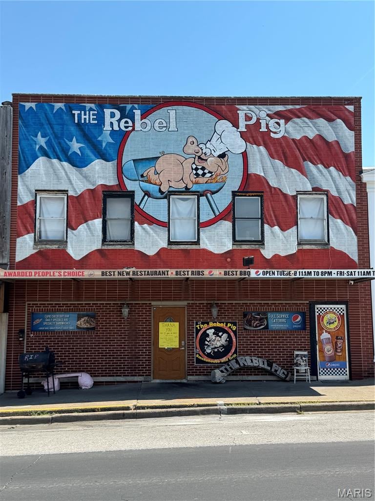 Formerly home to The Rebel Pig, this Main Street location offers an exceptional opportunity for an owner-operator, investor, or entrepreneur looking for a restaurant property with much of the costly infrastructure already in place. The main level features a functional restaurant and bar layout with commercial kitchen equipment including 2 commercial fryers , 48' flattop, 24' char grill and 6 top gas stove with oven , hood and fire suppression system, walk-in cooler and freezer, bar equipment, tables, chairs, fixtures, and additional equipment included with the sale. Major recent improvements include new HVAC units installed in 2026, eliminating a significant expense for the next owner. The property offers an inviting dining area, established bar space, commercial kitchen, and the infrastructure necessary to significantly reduce the time and expense associated with opening a restaurant from the ground up. A second floor provides substantial additional space and exciting redevelopment potential. While currently in need of renovation, the upper level could potentially be transformed into additional dining or event space, offices, apartments, short-term lodging, or other income-producing uses, subject to applicable zoning and approvals. A small basement is in good condition and provides useful additional storage and utility space. Located directly on Main Street in downtown Palmyra, the property benefits from excellent visibility and a recognizable location that has successfully served restaurant customers for years. Whether continuing its use as a restaurant and bar, creating a new dining concept, or exploring another commercial use, this property offers a unique combination of location, existing infrastructure, equipment, and future expansion potential that would be difficult and expensive to duplicate.