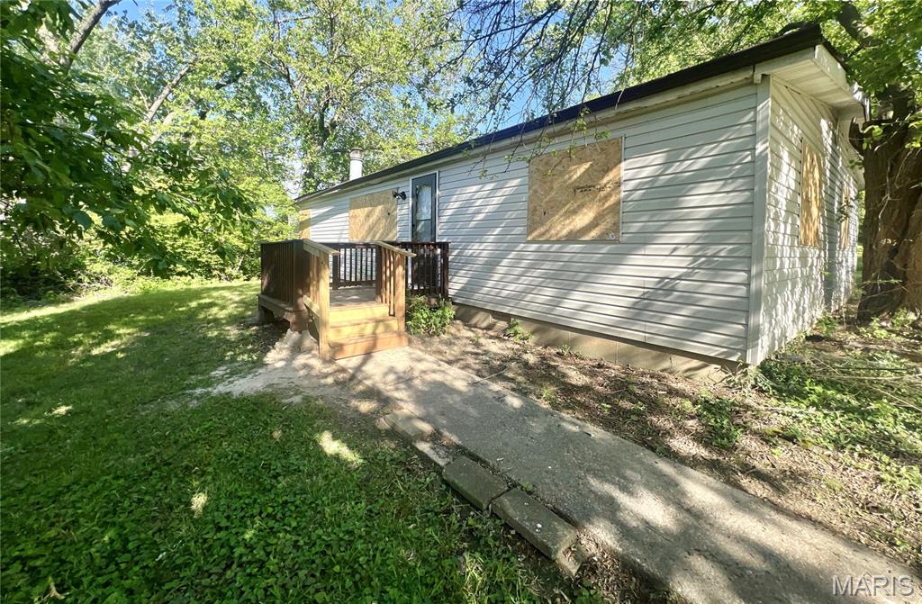 Welcome to 3534 Elm Point Rd in Saint Charles! This 3 bedroom, 2 bathroom home sits on a corner lot and offers a head start on renovations. With the rehab partially completed, the heavy lifting has begun—leaving the finishing touches to your personal style and vision. Whether you're an investor or a buyer looking to customize your next home, this property offers great potential and value. Sold as-is. No basement. Windows have been boarded up. Please bring a flashlight.