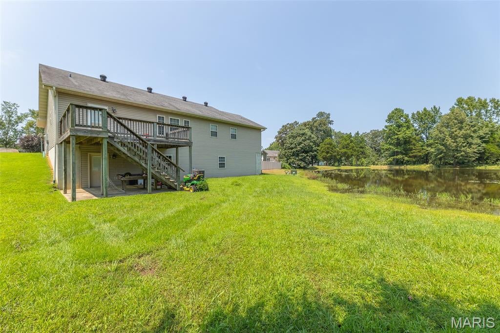 Don’t miss this 4-bedroom, 3-bath home offering approximately 3,200 square feet in the highly sought-after Still Creek Crossing subdivision! This home features a spacious layout with plenty of room for the whole family, a finished basement that provides additional living space, and a tiled walk-in shower in the primary bathroom. Step outside onto the back deck and enjoy views of the shared pond, making it the perfect spot to relax or entertain. Conveniently located close to schools, shopping, and restaurants, this home offers the space and location you’ve been looking for. Schedule your private showing today!
