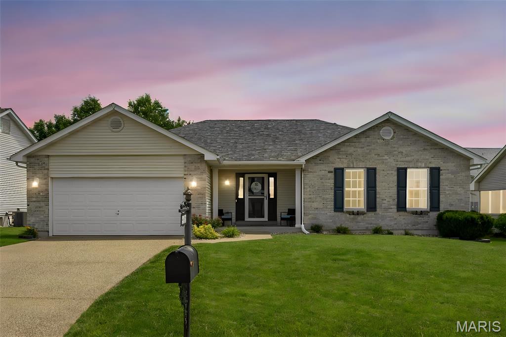 Welcome to this beautifully maintained brick-and-vinyl ranch home, ideally situated in a highly desirable neighborhood. Offering a perfect blend of comfort, functionality, and style, this exceptional property is ready to welcome its next owners.
Upon entering, you are greeted by a spacious foyer that opens to an inviting vaulted great room filled with abundant natural light. The stunning natural gas fireplace serves as a focal point, creating a warm and welcoming atmosphere for everyday living and entertaining.  The thoughtfully designed floor plan includes a separate breakfast room, providing an ideal setting for family meals and gatherings. A convenient breakfast bar offers additional seating for up to four guests. The well-appointed kitchen features an abundance of cabinetry, a pantry, stainless steel appliances, and generous counter space for meal preparation and serving.  Adjacent to the kitchen, you will find a convenient main-floor laundry room and easy access to the open staircase leading to the lower level.   The spacious primary suite serves as a private retreat, complete with a custom walk-in closet and a luxurious en-suite bath featuring dual sinks, a relaxing soaking tub, and a separate shower. Two additional bedrooms offer ample space and generous size double closets.
The finished lower level expands the living area and provides exceptional versatility. Whether you envision a media room, game room, family room, home office, fitness area, or hobby space, this level offers endless possibilities while still maintaining ample storage.  Step outside to enjoy the fully fenced, level backyard— extended back patio perfect for entertaining, outdoor activities, gardening, or simply relaxing in your own private outdoor oasis.
This move-in-ready home combines quality, comfort, and flexible living spaces in a location you'll love to call home.