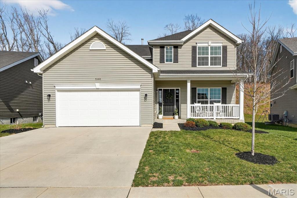 **OPEN HOUSE CANCELED** Step into style and comfort with this stunning 2-story home, perfectly tucked on a quiet cul-de-sac and backing to peaceful trees for added privacy. This modern 4 bed, 3 bath beauty welcomes you with an impressive two-story foyer and soaring 9-foot ceilings throughout the main level.
The open floor plan is filled with natural light from a wall of windows, creating a bright and inviting atmosphere. The open concept floor plan lets you enjoy cozy evenings in the living room by the fireplace or gather in the kitchen featuring stainless steel appliances, custom cabinetry, and a spacious center island with breakfast bar. A versatile office / dining room /flex space, laundry room, and half bath complete the main level.
Upstairs, you’ll find four spacious bedrooms and two full baths, including a relaxing primary suite designed for comfort. The lower level offers endless potential with a roughed-in full bath and egress window—ready for you to create over 1,000 additional square feet of living space and possible 5th bedroom. 
Located in the heart of Eureka, this home offers the perfect blend of small-town charm and outdoor adventure, all within a short drive to downtown St. Louis. With top-rated schools (enjoy the convenience of Eureka Elementary located within the subdivision!), local shops, and easy access to major highways, Eureka continues to be a sought-after destination for buyers looking for both comfort and convenience.