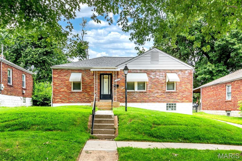 Charming and full of potential, this well-maintained home offers a wonderful combination of character, space, and outdoor living. Beautiful wood floors flow throughout much of the main level, while the inviting sunroom provides the perfect spot to enjoy morning coffee, unwind with a book, or take in views of the backyard year-round. The finished lower level adds valuable living space and features a full bathroom, making it ideal for a recreation room, guest suite, home office, or fitness area. A convenient oversized one-car garage provides additional storage,  could be a great workshop and everyday functionality. Step outside to discover an expansive, fenced backyard surrounded by mature trees, offering privacy, room to play, garden, entertain, or simply enjoy the peaceful setting, and backs up to an open field. Whether hosting summer gatherings or relaxing outdoors, this yard is a standout feature. Conveniently located and filled with opportunity, this home combines comfortable living spaces, a finished basement, sunroom, garage, and an exceptional outdoor setting—all ready for its next owner to make it their own.  Property to be sold in "as-is" condition. Please use a special sales contract when subitting offers.