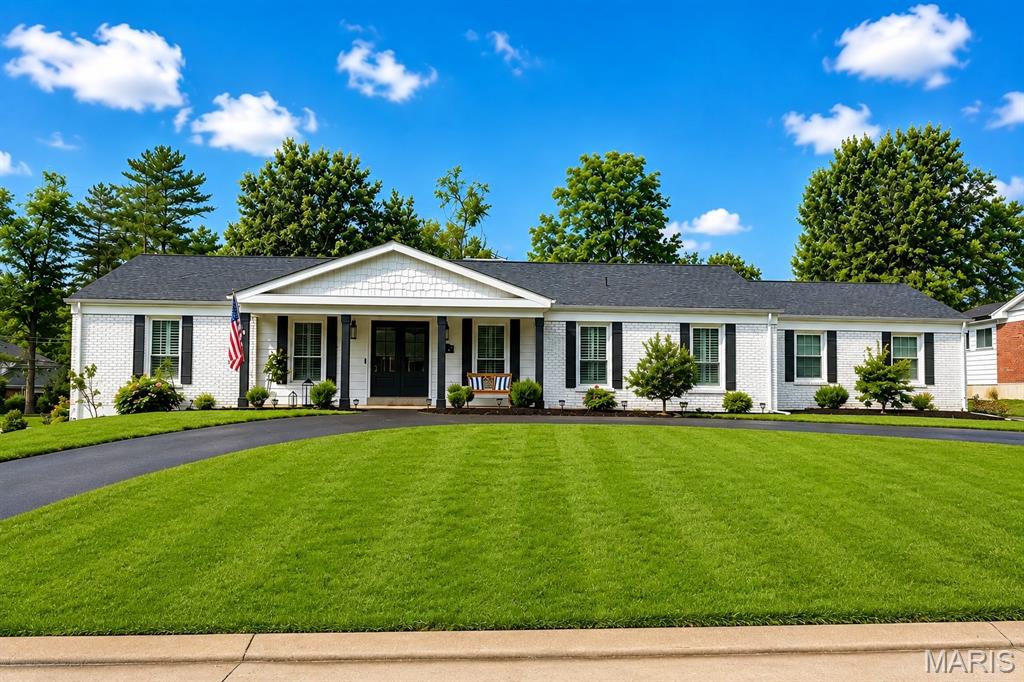 This completely reimagined ranch in the heart of Des Peres is truly exceptional! Thoughtfully redesigned from top to bottom, this 3-bedroom, 3-bath home offers the perfect combination of modern style, quality craftsmanship, and everyday functionality. Step inside to an inviting open-concept floor plan where the living room, dining area, and beautifully renovated kitchen flow seamlessly together—creating an ideal space for entertaining and daily living. The stunning kitchen features all-new cabinetry, updated flooring, stainless steel appliances, and a gas range, while the addition of a convenient main-floor laundry room and an added half bath enhance the home's functionality. The see-through gas fireplace creates a warm focal point shared between the main living area and sunroom, where new windows, flooring, and a dedicated mini-split HVAC system provide year-round comfort. No detail was overlooked, with extensive updates including a new roof (2026), new siding, fresh interior and exterior paint, updated lighting throughout, new front and rear doors, all plumbing replaced with PVC, and buried electrical lines. Outside, the professionally landscaped yard offers exceptional curb appeal and is designed for both relaxation and entertaining with an in-ground pool, privacy fence, sprinkler system, circular driveway, and storage shed. With countless improvements already completed, this move-in-ready home offers peace of mind and an outstanding opportunity to enjoy one of Des Peres' most desirable locations.