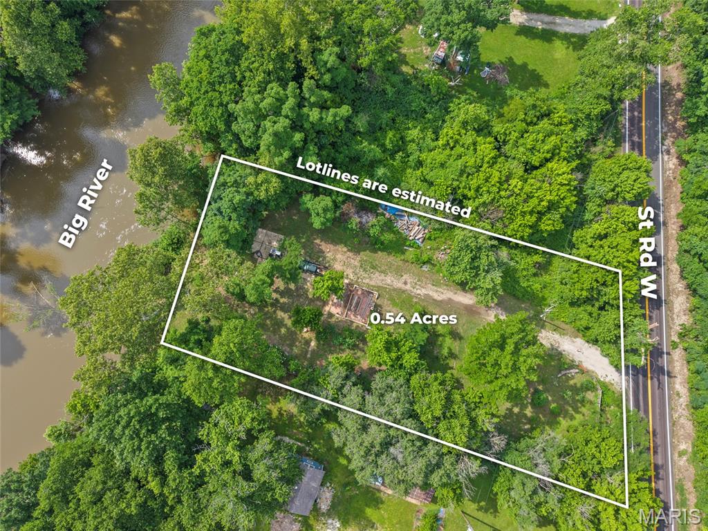 Discover the perfect blend of nature, recreation, and convenience with this beautiful 0.54-acre riverfront property offering direct frontage along the scenic Big River. Surrounded by mature trees and lush greenery, this unique lot provides privacy, tranquility, and endless possibilities.

The property features a cleared area with easy road access, making it ideal for a future homesite, weekend retreat, camping getaway, or recreational property. Enjoy fishing, kayaking, floating, and relaxing along the riverbank while taking in the peaceful surroundings.

Located just minutes from Brookdale Farms, you'll have quick access to one of the area's most popular destinations, known for its seasonal festivals, live entertainment, holiday celebrations, friendly events throughout the year. You'll even have the opportunity to enjoy the spectacular fireworks displays from many of their special events right from your own property.

Whether you're looking for a private escape or a place to build your dream riverside retreat, this Big River property offers a rare opportunity to own waterfront land in a highly desirable location.

Come experience river life and all the nearby attractions this property has to offer!