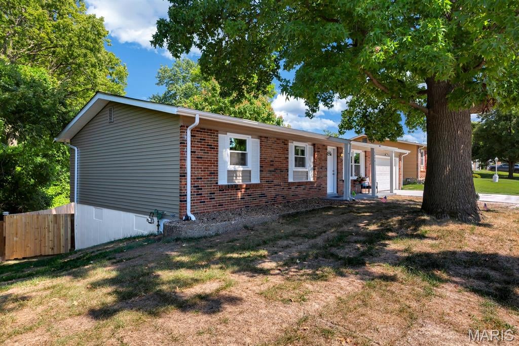 Classic 70's Ranch, completely renovated from top to bottom & inside and out, just waiting for its next owner!  Driving to this home through the Marquette Hills neighborhood off Elm St., you'll notice that you are slowly driving upward and slowly inclining through the neighborhood until you get to La Salle Drive, where it all makes sense!  Drive to the end of the street and you will immediately notice the scenic view, along with the home on the right, where both could be yours!  This home is situated on a generous sized .24 acre, end of street lot on a very quiet & friendly street.  Approaching the home, there's a gentle curve in the walkway (classic 70's) and the Breezeway-like, covered front porch that's stretched just enough for morning coffee or neighborly waves.  This home brings retro warmth, classic lines and timeless suburban charm into the modern day.  Completely restored with modern finishes, consistent LVP flooring throughout the main level and with all new systems and appliances, this homes next owner will have low-maintenance living for a long time.  Just add your personal touches and move right in!  The basement rec room area could be so many things, allowing you to customize your personal living needs.  Do you need an extra family/tv room, a play area for the kids or a large sized area to put a pool table & bar for parties?!  The options are limitless for this rec room.  Down the hall from the rec room is another bonus room area with a privacy door, perfect for a home office, yoga room/gym or whatever you need it to be for extra living space.  Utility Room/Laundry has workshop/hobby table and lots of shelving for storage and all those holiday decorations.  Next to the bonus room is a 3rd full bathroom and walk-out access to the spacious backyard.  Have I mentioned the backyard?!  WOW, This backyard is something!  And it is waiting for it's next owners imagination and fun.  There is so much backyard space, you won't believe it until you see it!  Backyard is complete with brand new privacy fencing and 2 gates, along with a brand new deck for outdoor entertaining.  Come see 3424 La Salle Drive for yourself!  You might just Fall in Love!