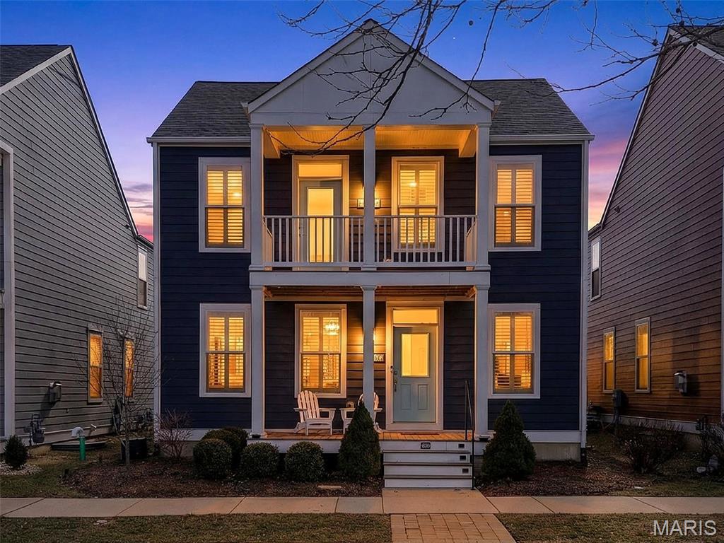 Gorgeous, Upgraded Home w/ Double Balconies and Exceptional Detail Throughout! This beautifully appointed 4-bedroom, 2.5-bath home offering nearly 2,300 sq. ft. From the moment you step inside, you’ll notice the impressive 9’ ceilings on both the main and upper levels, plantation shutters throughout, 3 panel doors &  engineered hardwood flooring across the main floor. The heart of the home is the stunning kitchen, featuring quartz countertops, designer backsplash, 42” custom cabinetry with crown molding and under-cabinet lighting, a spacious island with seating, gas stove, and stainless steel appliances. The living room is anchored by a warm gas fireplace framed with custom built-in bookshelves, while the dining area showcases add'l custom cabinetry. Laundry room (washer and dryer included), custom coat closet, and powder room complete the main level. Upstairs, retreat to the luxurious primary suite, offering dual custom closets with built-in shelving, private access to your own veranda balcony, and bathroom with dual adult-height vanities and a stand-alone shower. Three additional bedrooms—one with a walk-in closet—along with a spacious loft, hall bath, and linen closet. The lower level includes custom shelving for excellent storage and is ready for your unique design should you desire additional finished space. Step outside to a truly gorgeous backyard, professionally landscaped with custom fencing and stamped concrete, creating an ideal setting for relaxing or entertaining. A 2-car attached garage and extended driveway complete this exceptional property.  Nestled in one of the area’s most desirable communities, this vibrant neighborhood called New Town @ St. Charles offers resort-style living at its finest — featuring pools, including an impressive 700-foot lazy river. Enjoy scenic lakes and canals ideal for fishing, swimming, floating, kayaking, and paddleboarding, along with an amphitheater, popular restaurants, volleyball and pickleball leagues, a grocery store, charming shops, and so much more — all designed for an active, connected lifestyle.