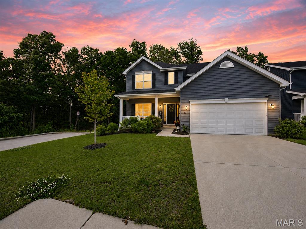 Better than new and ready now—no waiting to build, no ongoing construction, and no uncertainty about what your finished neighborhood will look like. Built in 2022 and loaded with upgrades, this 4-bedroom, 2.5-bath home is ideally situated on a quiet cul-de-sac in the sought-after Holt High School area, directly across from the community park and backing to wooded common ground for a rare combination of privacy, views, and neighborhood convenience. Inside, the open-concept floor plan showcases a luxury kitchen with Cambria countertops, select-grade cabinetry with crown molding, custom tile backsplash, dimmable under-cabinet lighting, a large center island, and seamless flow into the great room highlighted by a dramatic wall of windows overlooking the backyard. A two-story foyer with upgraded spindled staircase creates an impressive first impression, while 9-foot ceilings and main-floor laundry add everyday comfort and functionality. The spacious primary suite features a walk-in closet and private luxury bath with soaking tub, separate shower, private water closet, adult-height vanities, and upgraded finishes throughout. Additional features include dual-zoned Lennox HVAC systems, a full basement with bath rough-in and egress window, transferable builder structural warranty (per builder terms), and a spacious composite deck overlooking the fully fenced backyard and wooded surroundings. This is the opportunity buyers hope to find—a nearly new home with premium upgrades, a completed neighborhood setting, and a lot that simply cannot be duplicated by starting from scratch.