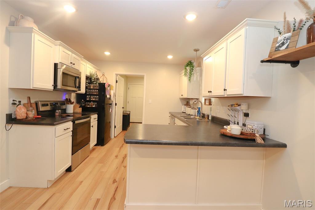 Don’t miss this well-maintained 2021-built ranch in the heart of Fulton offering over 1,300 sq ft, 3 bedrooms, 2 full baths, and a 2-car garage. Designed with everyday comfort in mind, the home features an open layout that connects the kitchen, dining, and living area, creating a space that feels both functional and inviting.

The kitchen offers ample cabinet space and stainless steel appliances. The primary suite includes dual vanities and a spacious walk-in closet, while main-level laundry adds convenience to daily living. Durable flooring, clean finishes, and a thoughtful layout make this home easy to enjoy from day one.
Step outside to a covered front porch and a manageable lot with simple upkeep—ideal for those looking for low-maintenance living.
The location adds even more value, with Memorial Park just 0.5 miles away, Fulton Country Club approximately 0.6 miles, Callaway County Sheriff’s Office about 0.9 miles, Fulton Police Department around 1.2 miles, and Moser’s Discount Foods roughly 1.3 miles from the home. Fulton State Hospital is also within a short 4-mile drive. The area is supported by major employers including Fulton State Hospital, Hitachi Energy, Ameren Missouri Callaway Energy Center, as well as Westminster College and William Woods University, making this a practical option for both commuting and long-term value.
A solid option for buyers looking for a newer home with a simple layout, convenient location, and easy living

Prospective buyers, please ensure you have a preapproval letter or proof of funds ready before scheduling a showing. Buyer to verify all measurements and online data.