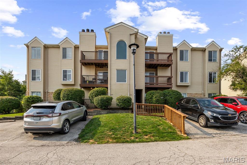 Beautifully renovated upper-level 2-bedroom, 2-bath condo in Wildwood! Thoughtfully updated throughout, this move-in ready home features new flooring in the kitchen, dining, and living areas, plus new carpet in both bedrooms. The stunning kitchen offers new cabinets, granite countertops, a farmhouse sink, and new stainless steel appliances. Both bathrooms have been tastefully updated. Additional updates include new closet doors, new windows, new sliding glass door, new lighting in the kitchen, dining room, and bathrooms, and a new furnace for added peace of mind. The spacious living room features a vaulted ceiling and opens to a private balcony—perfect for enjoying your morning coffee or relaxing at the end of the day. Additional highlights include private storage space and an in-unit laundry hookup. Ideally located with easy access to walking trails, cycling paths, and Wildwood Town Center for shopping, dining, and entertainment, this beautifully updated condo offers the perfect blend of comfort, style, and convenience.