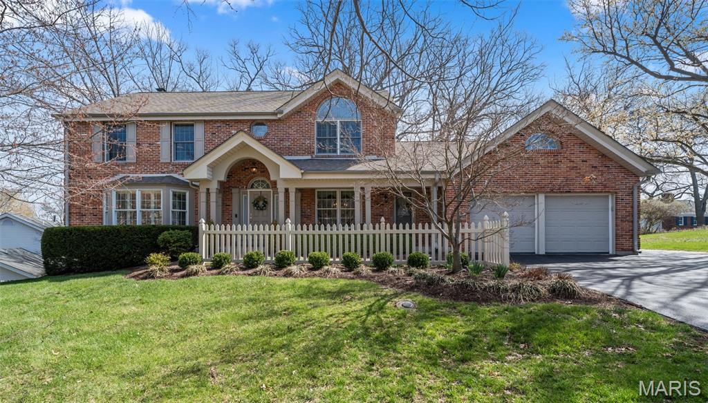 Beautifully updated home in Manchester, MO located in the highly sought-after Parkway School District and within walking distance of Henry Elementary School. Enjoy the convenience of a school bus stop just one house away, nearby grocery stores, and easy access to local favorites like restaurants, and multiple Starbucks locations.

Inside, the home offers a spacious and inviting layout with custom built-in bookcases, crown molding, and a wood-burning fireplace that creates a warm and welcoming living space. The renovated white kitchen is designed for everyday living and entertaining, featuring a large eat-in area, peninsula seating, center island, and double ovens, making it ideal for hosting gatherings and holiday meals.

One of the home’s most beloved spaces is the large screened-in porch, perfect for relaxing nearly three seasons of the year. The private wooded backyard offers exceptional privacy and natural beauty, anchored by a mature oak tree and surrounded by red bud trees and other greenery.

Upstairs you’ll find four spacious bedrooms, including a generous primary suite with two large walk-in closets and an en-suite bathroom featuring double sinks, a soaking tub, and a separate shower. The hall bathroom also includes double sinks, offering added convenience for busy mornings.

The finished basement expands the living space with two additional bedrooms, a full bathroom, a den/recreation area, and abundant storage options, making it ideal for guests, hobbies, or home office setups.

Additional highlights include Anderson windows, hardwired smoke detectors, water filtration system, irrigation system, low-maintenance landscaping, no-maintenance deck, and a laundry room with large utility sink. Storage space is plentiful throughout the home.

With its flexible layout, multiple potential home office spaces, beautiful wooded setting, and prime location near schools, shopping, restaurants, and major services, this Manchester home offers both comfort and convenience in one of the area's most desirable communities.