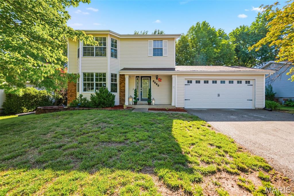 BOM No fault to seller! New Roof to be installed before 6/1! Nestled in a peaceful St. Peters neighborhood, this charming 3-bedroom, 2.5-bathroom home offers the perfect blend of comfort and convenience. Spanning 1,380 square feet, the residence features a thoughtful layout designed for modern living. Wood like floors flow throughout the main level living room, formal dining room, kitchen and breakfast room.  A well designed kitchen features pantry, stainless steel appliances and granite countertops. Upstairs you will find three bedrooms and a hall bath. The ensuite primary includes two closets and a full bath with dual sinks. The lower level family room provides another hang out spot. The fully fenced yard is perfect for furry family members and summer nights. Seller providing a 1 year Choice Home Warranty for peace of mind. Don't wait to see this one!