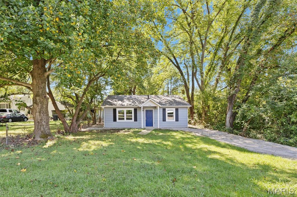 Updated from top to bottom, the list of updates on this home is extensive. New roof, electrical (box was moved and inspected), New windows, New HVAC (heat and air conditioner). All new bathroom includes exhaust fan, cabinets, sink, countertops, vanity, bathtub, toilet. Safety first with new carbon monoxide and fire detectors. New floors, hardware and closet doors. Updated kitchen includes new refrigerator, electric range/oven, microwave, and dishwasher. New sink and faucet, new cabinets and counters. 

Enter into the spacious living room and see a room to hang out with friends after preparing game night snacks in the comfortable kitchen with wood counters, bright cabinetry and updated SS appliances. Watch nature from the window over the kitchen sink. In the bathroom 2 sinks will make getting ready easy and the laundry area has a folding area conveniently planned with cabinetry for storage. Both bedrooms are nicely sized, it will be hard to choose which one is better! The large level lot is a blank slate for your imagination. 

Close to everything yet tucked away, no HOA. Check it out today.