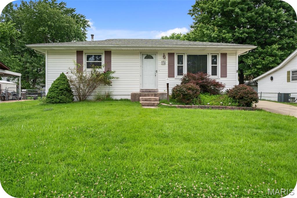 This Florissant cutie would make a wonderful starter home or investment property alike! On the main floor, note the hardwoods throughout, fresh paint and updates galore! The living room flows into an adorable breakfast room and crisp updated kitchen with all new appliances and quartz countertops. Down the hall, check out the updated bathroom with new vanity, toilet and a tiled floor. Two bedrooms finish out the floor. Downstairs, the living space is vastly amplified by a large living room with fireplace and new LVP flooring. There is also a bonus room that would be perfect for an office, yoga space or whatever your heart desires! Out back, check out the long driveway and one car garage and HUGE backyard that is perfect for your fur babies! There's nothing left to do but move in and why wouldn't you for a price like this? Welcome home!
