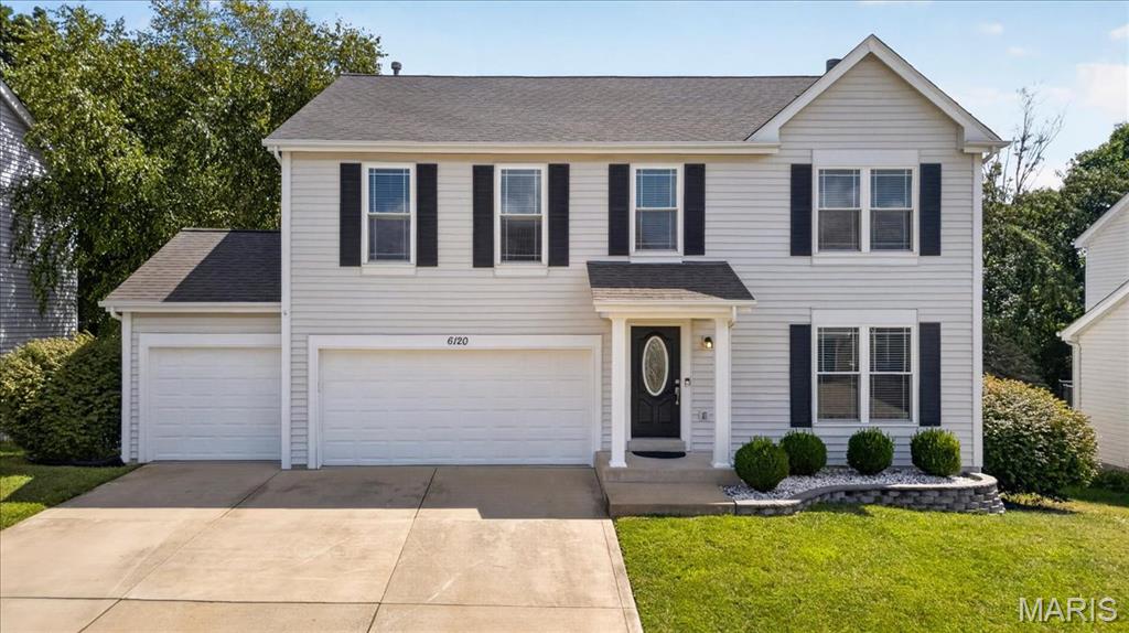 **Completely Renovated & Move-In Ready!** Welcome to this beautifully updated 2-story home in the desirable Meadow View neighborhood, offering over 2,500 sq. ft. of above-grade living space, a finished walkout lower level, and a rare 3-car garage. Extensively renovated from top to bottom, this home delivers the space, finishes, and features today's buyers are looking for.

The main level welcomes you with wide-plank flooring, tall baseboards, fresh finishes, and a bright, open feel. At the heart of the home is the completely renovated kitchen featuring 42-inch white Shaker cabinetry, quartz countertops, an expanded center island, recessed lighting, and generous space for cooking, gathering, and entertaining. Updated bathrooms continue the home's cohesive design with coordinating cabinetry and quartz countertops.

Upstairs are three spacious bedrooms, including an impressive primary suite with wide-plank flooring and a large his-and-hers walk-in closet. The additional bedrooms feature plush new carpeting.

The finished walkout lower level adds valuable living and entertaining space with wide-plank flooring and a new half bath—ideal for a family room, game room, home office, guests, or movie nights.

Additional highlights include Pella windows, a fireplace, main-floor laundry, lawn irrigation system, and 3-car garage.

The outdoor space is equally impressive. The fully fenced backyard features an oversized patio and a completely rebuilt deck with new deck boards, railings, and stairs—creating multiple spaces for entertaining, grilling, or simply relaxing outdoors.

Conveniently located just 10 minutes from I-270, approximately 35 minutes from St. Louis Lambert International Airport, and only 5 minutes from Starbucks, with easy access to shopping, dining, highways, and everyday conveniences.

**With extensive renovations, more than 2,500 sq. ft. above grade, a finished walkout lower level, 3-car garage, and fantastic outdoor living space, this is a home that truly stands apart. Move in and enjoy from day one!** Primary bathroom glass shower doors on order, along with replacement glass for three window panes.