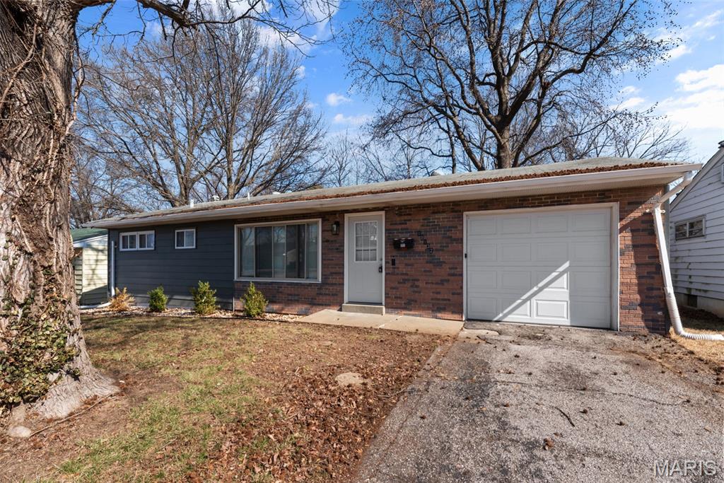 Step into this nicely updated home in Dellwood offering comfort, space, and move-in ready convenience. Fresh paint and recently installed windows help create a bright and welcoming atmosphere throughout the home. The updated kitchen features plenty of cabinetry and counter space along with newer appliances including an electric range, stainless steel refrigerator, microwave, and dishwasher. The main level offers a spacious living and dining room combination highlighted by a remote-controlled ceiling fan. The finished lower level expands the living area with approximately 900 additional square feet, providing a large recreation space and a walk-in bar that’s perfect for entertaining. A separate laundry area and ample storage space are also located in the basement. Outside, enjoy a fully fenced backyard with room to relax or host gatherings. Due to Dellwood rental restrictions, this property is best suited for an owner-occupant. Sellers have passed occupancy.