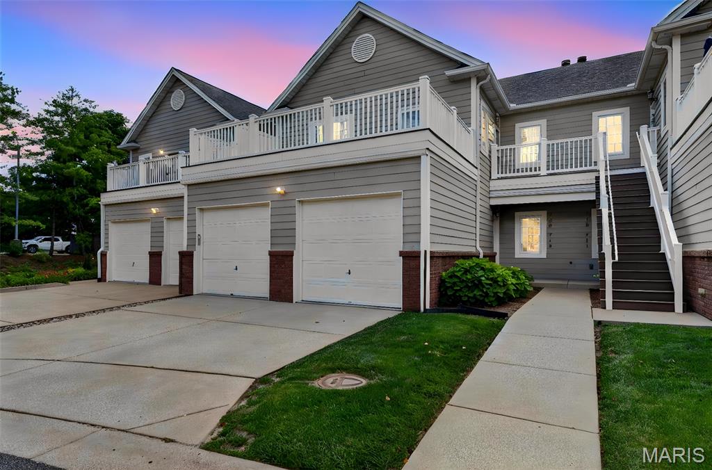 Are you wanting to live in the Kirkwood School District, but can't find anything nice enough in your price range? Well, here it is! This condo was renovated 4 years ago, when the current owner purchased. She removed all carpet, installing luxury vinyl flooring throughout the first floor. Kitchen cabinets were professionally painted, New gorgeous quartz and backsplash was installed, as well as an under mount black sink, faucet, garbage disposal and hardware, plus all new lighting and ceiling fans on the first floor. Hall bathroom received a brand new vanity and everything was freshly painted. There were also plantation shutters installed in the family room/dining room, overlooking Grant's Trail along with a marble fascade and wood mantel for the main floor, gas fireplace. The walk out basement was awesome the way it is, but a wall of mirrored closets were installed, adding more storage space. The walk out basement is it's own living area with a 2nd kitchen, full bath, bedroom area, dining and family room. Ceilings are at least 10 ft and there are large windows and french doors out to the private patio and an electric fireplace. If you have extended family living together, this gives the family 2 separate living spaces, for the price of one. Furnace was replaced 2 years ago, roof is 1.5 years old, Windberry was newly paved last year and is being sealed next month. Seller is supplying an American Home Shield Warranty to the Buyer, upon closing. Welcome Home to your perfectly situated  Kirkwood gem! Live like a Queen on a Princess Budget!