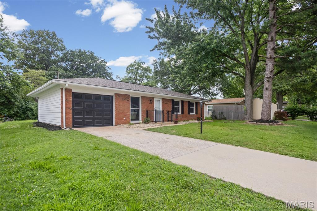 Charming 3 bed, 1.5 bath home in desirable Lincolnshire! Situated on a spacious lot backing directly to a park with walking trails, tennis courts, and a scenic creek—offering a peaceful, park-like setting. Inviting curb appeal leads into a bright living room filled with natural light and views of the backyard. Eat-in kitchen features ample cabinet space, new SS appliances, and washer hookup. Convenient access to the attached 1-car garage with brand-new garage door and electric opener. Exit out to the concrete patio overlooking the park—perfect for relaxing or entertaining with direct access to the walking trail. Home offers two nicely sized bedrooms plus a primary bedroom with a private half bath. Updates include fresh interior paint, updated lighting, new water heater, recently serviced HVAC, exterior paint, and brand-new windows. Centrally located near schools, shopping, dining, hospitals, downtown Belleville, Scott AFB, and St. Louis. Municipal occupancy completed—move-in ready!