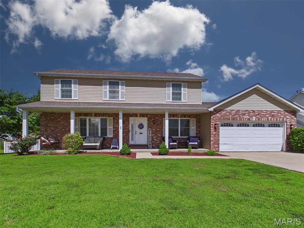 Fall in love with this beautiful TWO-STORY home, built in 2014! 5 BEDROOMS and 3 FULL Bathrooms! Located on the outskirts of town & on a cul-de-sac. Enjoy coffee time on the covered front porch. Kitchen has all appliances staying, beautiful maple cabinets & a pantry. Living room is bright and airy. Dining room is right off of kitchen. Main floor laundry & mud room plus a water softener. Bedroom and full bath on main level - could also be used as a playroom or office. Upper level has primary suite with walk in closet & full bath with double vanity. 3 secondary bedrooms on upper level with an additional full bath with double vanities - plus linen closet. You'll love the park-like backyard - vinyl fencing, garden bed, two-tier deck (great for BBQing) & a shed - all this on a huge lot! Hot water heater (2024) and new blower motor on a/c. Location is a bonus - on the outskirts of town and conveniently located by highway access & dining. Welcome Home!