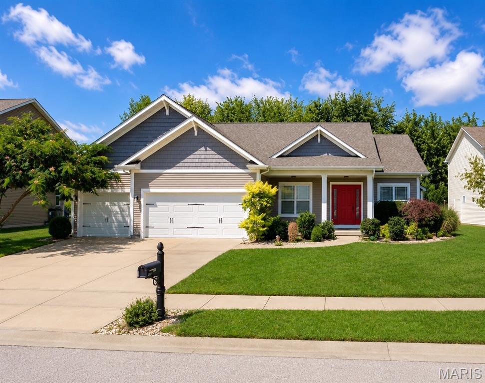 Presenting a meticulously maintained Craftsman-style ranch, offering 1,750 sq. ft. of well-planned, single-level living located on a cul-de-sac. Recently refreshed with a new roof, fresh paint, luxury vinyl plank (LVP) flooring, and new carpeting throughout, this 3-bedroom, 2-bath home is truly move-in ready. The open-concept layout features spacious living and dining areas, luxury vinyl plank flooring, and a welcoming fireplace that's perfect for gatherings. The gourmet kitchen, complete with a gas stove, is thoughtfully designed for both everyday cooking and entertaining. The spacious primary suite serves as a serene retreat with elegant coffered ceilings and a private en-suite bath. The full basement boasts 9-foot ceilings, two egress windows, rough-in framed walls, and a rough-in bathroom, offering limitless potential for future finishing. Outside, you'll find a 3-car garage and a level lot with mature tree lines and a 6-foot privacy fence, providing both tranquility and scenic views. Ideally located for convenient access to both Scott AFB and St. Louis, this beautifully updated home blends quality, comfort, and room to grow. Seize this exceptional opportunity before it hits the market!