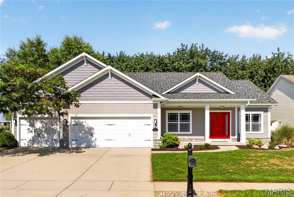 Presenting a meticulously maintained Craftsman-style ranch, offering 1,750 sq. ft. of well-planned, single-level living located on a cul-de-sac. Recently refreshed with a new roof (2026), fresh paint, luxury vinyl plank (LVP) flooring, and new carpeting throughout, this 3-bedroom, 2-bath home is truly move-in ready. The open-concept layout features spacious living and dining areas and a welcoming fireplace that's perfect for gatherings. The gourmet kitchen, complete with a gas stove, is thoughtfully designed for both everyday cooking and entertaining. The spacious primary suite serves as a serene retreat with elegant, coffered ceilings and a private en-suite bath. The full basement has 9-foot ceilings, 2 egress windows, roughed-in framed walls, and a roughed-in bathroom, offering limitless potential for future finishing. Outside, you'll find a 3-car garage and a level lot with mature trees and a 6-foot privacy fence, providing both tranquility and scenic views. Ideally located for convenient access to both Scott AFB and St. Louis, this beautifully updated home blends quality, comfort, and room to grow. Seize this exceptional opportunity while you can!
