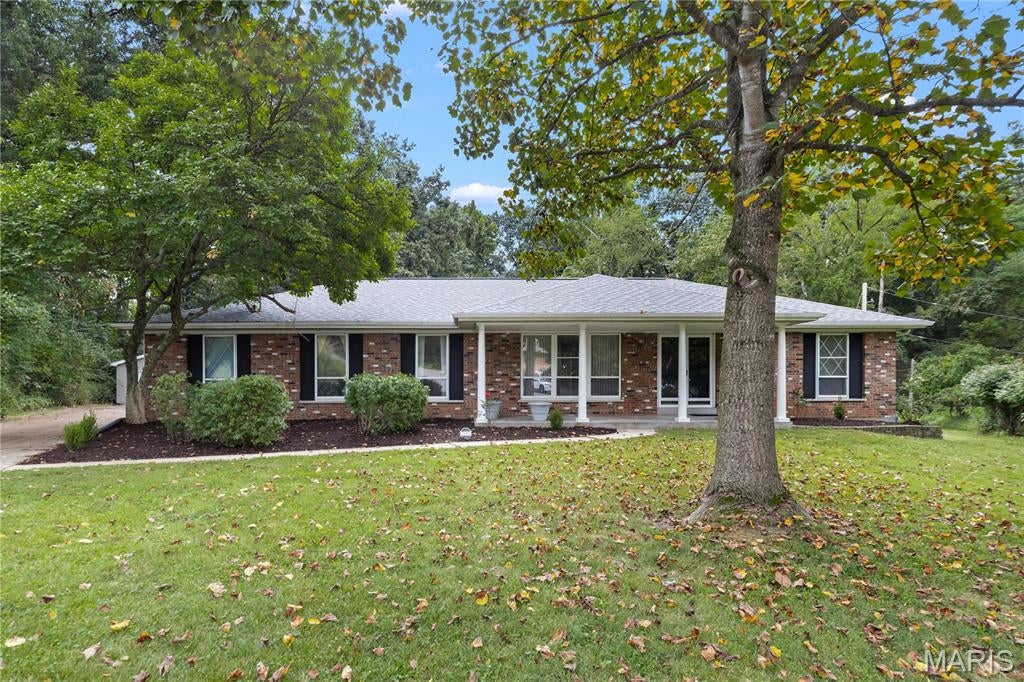 Great House! Don't miss this beautiful brick home tucked away on a quiet cul-de-sac in one of St. Ann's most desirable neighborhoods within the Pattonville School District! Situated on a large lot backing to McDonnell Park, this home offers a private backyard, large driveway, attached 2-car garage PLUS an oversized detached 2-car garage—perfect for a workshop, extra vehicles, or storage. Inside you'll find 3 bedrooms on the main level, including a spacious primary suite with a walk-in closet. The large finished basement offers 3 ADDITIONAL SLEEPING ROOMS, a full bath, and plenty of living and entertaining space. Unique built-in INDOOR HOT TUB!? Major systems and roof have been updated recently. A rare combination of space, privacy, garage capacity, and location with plenty of potential to make it your own. Seller prefers to sell as-is. This won't last long!