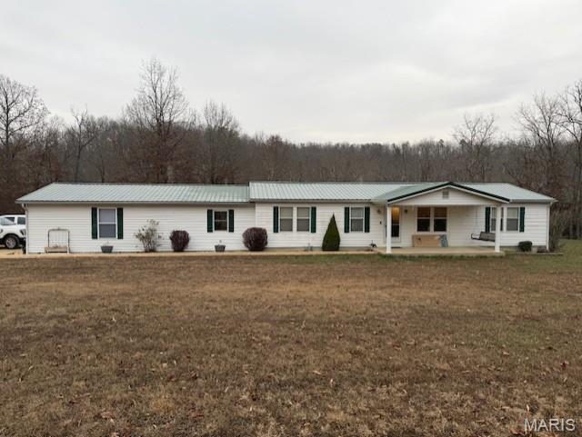 Experience peaceful country living in this spacious 1,692 sq ft manufactured home featuring 5 bedrooms and 2 bathrooms. Set in a beautiful, tranquil setting this property offers wide-open views and plenty of room to relax. A barn with a lean-to provides great storage or hobby space, adding to the versatility of the land of 4.12 acres +/-. Inside, you'll find comfortable layout with generous living space. Enjoy the quiet surroundings and the beauty of rural scenery right outside your door! This property blends comfort, privacy, and country charm- the perfect place to call home.