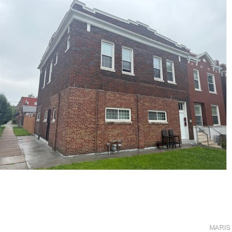 Investor Opportunity! This 2 family building is currently occupied with renters upstairs paying $600 month to month and lower level paying $500 month to month. Main level offers 2 bedrooms with 1.5 bath, updated kitchen and living room with some updated appliances and fixtures. Upstairs offers 2 bedrooms with large open living room space and full kitchen, bathroom and needs some updating and floor joist repair. 22x33 commercially zoned detached building just behind the updated privacy fenced back yard has updated garage doors, roof in 2016, 200 amp service and half bath. Additional updates include most plumbing 2000, 2 panel boxes 90's, windows 2008, tuck pointing 2016 and gutters.