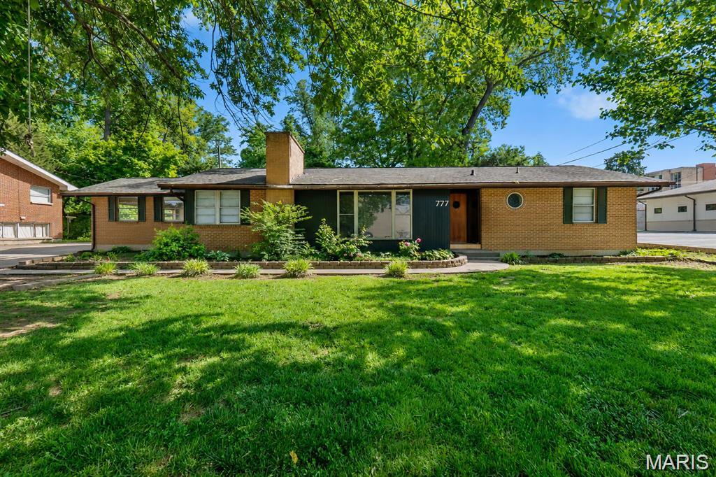 Location, Location! This charming 3 bed/2 bath brick, ranch home, is literally a stone's throw away from the university's campus. With covered parking, a partially finished basement, and tenants in place through, investors should take note!