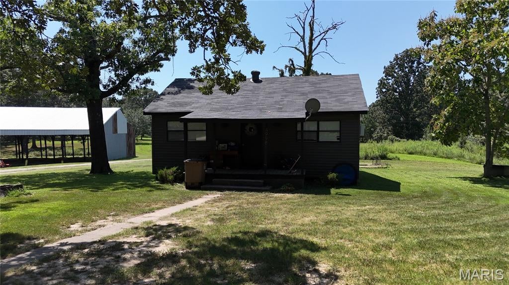 Discover the perfect blend of comfort, outdoor recreation, and opportunity with this cute, updated 2-bedroom, 1-bath home situated on 1.5 (+/-) beautiful acres. Located just minutes from Wappapello Lake and the Mark Twain National Forest, you'll have easy access to boating, fishing, hunting, hiking, and countless outdoor adventures. Whether you're looking for a peaceful country retreat, weekend getaway, or property with room to grow, this one is ready to enjoy!