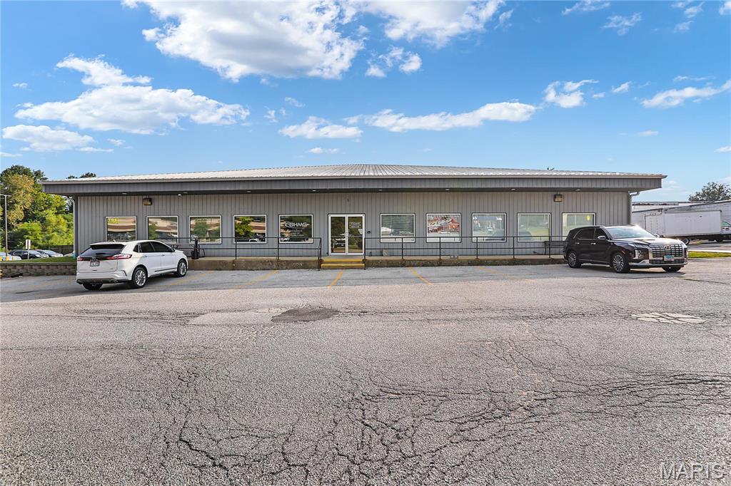 FOR LEASE. Excellent location for Commercial space with many possible uses.  This space was recently used as a professional engineer office.  Class A finishes inside.  Multiple private office spaces demised as well as big open bullpen area with tall ceiling heights.  Men & woman Bathrooms.  Full modern kitchenette/break room.  Recently built out in 2019 with new modern finishes.  High end noise dampening ceiling grid, high end commercial carpet squares.  Lots of natural light from massive windows on perimeter and lots of interior lighting as well. Can be customized for your use & needs.  Space starts $5k/month & may be subject to negotiation depending on space needed and tenant finishes required.  Up to 5,000 SF of space available.  Plenty of parking & will vary depending on use.   There are several permitted uses in the B4 district.  Excellent location.  Call broker for add'tl info.  Personal office property desks, cubicles, etc also available for purchase if needed.  Available immediately. Some Accessible Features Location: Business Park, Retail Center, Suburban.
