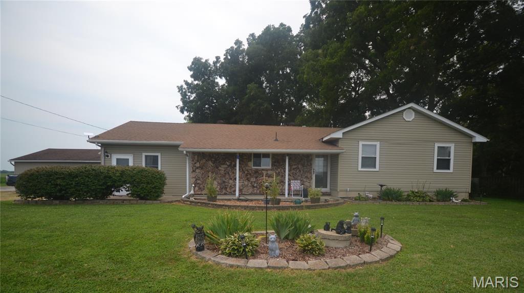 Charming 3-Bedroom Home in the Freeburg School District

Welcome home to this well-maintained 3-bedroom, 1.5-bath property situated on a spacious corner lot totaling approximately 0.51 acres across four separate parcels. This charming home offers a warm, rustic feel with numerous updates, including a roof that is only 2 years old, a recently replaced water heater, and freshly painted interior spaces.

The large kitchen comes complete with all appliances and opens directly to the inviting living room, creating an ideal space for everyday living and entertaining. The living room features a cozy gas fireplace and a door leading to a large deck overlooking the backyard.

A separate room with its own exterior entrance provides excellent flexibility and could be used as a home office, hobby room, or additional living space. The generous laundry room includes washer/dryer hookups and a large utility closet for extra storage.

The partially finished basement adds valuable living space and features a spacious family room with a wood-burning fireplace that has never been used by the current owner. An additional entertainment area offers plenty of room for gatherings, recreation, or relaxing. The unfinished portion of the basement includes a large workshop, perfect for projects, storage, or hobbyists.

Outside, you'll find a fully fenced backyard with separate fenced areas designed for both small and large dogs, making it perfect for pet owners. The corner lot offers ample outdoor space while maintaining privacy and functionality.

Located in the highly sought-after Freeburg School District, this property combines country charm, practical updates, and plenty of room to enjoy both indoors and out.

Features Include:
3 Bedrooms
1 Full Bath and 1 Half Bath
Large Kitchen with Appliances Included
Open Living Room with Gas Fireplace
Separate Office/Flex Room with Exterior Access
Spacious Laundry Room
Partially Finished Basement
Family Room with Wood-Burning Fireplace
Entertainment Area in Basement
Large Workshop Area
Large Deck
Recently Replaced Water Heater
Roof Only 2 Years Old
Fresh Interior Paint
Fully Fenced Backyard with Separate Areas for Small and Large Dogs
Corner Lot
Four Parcels Totaling 0.51 Acres
Outstanding Freeburg Schools

Move-in ready and full of character, this charming home offers plenty of space, updates, and flexibility for today's lifestyle.