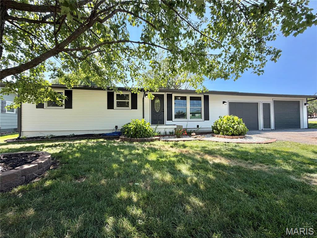 Fully Remodeled 3-Bed, 2-Bath Ranch with Stunning Upgrades!

Step into this beautifully renovated ranch home offering 3 spacious bedrooms, 2 full baths, and a 2-car garage. Every detail has been thoughtfully updated — including a new roof, siding, HVAC, water heater, and more — giving you peace of mind for years to come.

The gourmet kitchen boasts elegant cabinetry with crown moulding, brand-new stainless steel appliances, and a layout perfect for both cooking and entertaining. Vaulted ceilings with rich wood beams create a warm, open feel throughout the main living areas.

A see-through gas fireplace connects the dining room and family room, adding charm and comfort to your gatherings. The lower level offers endless possibilities — with abundant storage, a full bath, and the potential to finish the space to suit your needs.

With so many updates and timeless design touches, this home is truly move-in ready. Don’t miss your chance to make it yours!