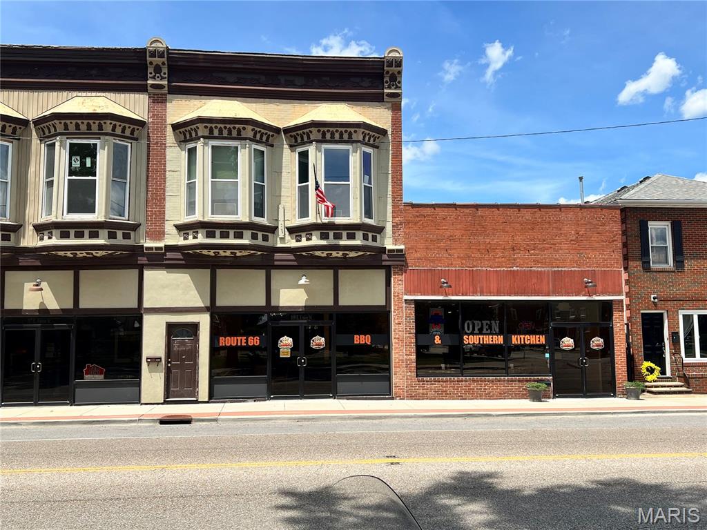 Investment opportunity in the heart of downtown Litchfield. This two story commercial building is ideally located on a busy high visibility street and offers excellent income producing potential. The main level features a spacious commercial storefront that was previously utilized as a gaming establishment but the possibilities are endless. Whether your looking to open a retail shop, office space, salon, restaurant or another business venture, this versatile space is ready for your vision. 
The second level offers a remodeled one bed, one bath apartment that is nearing completion and just needs a few finishing touches before it is ready for rent. With separate residential and commercial opportunities under one roof, this property provides multiple avenues for generating income. 
Whether your an investor, entrepreneur, or someone looking to expand their portfolio, this downtown property offer tremendous potential and value. Don't miss your chance to own a building with endless possibilities and strong income producing potential.