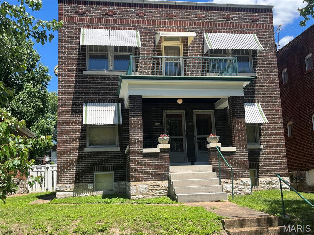 Wonderful opportunity to own this brick 2-Family in the Boulevard Heights neighborhood. Each one bedroom unit has over 1,000 square feet, with beautiful hardwood floors in the large living, dining and bedroom.There is also a decorative fireplace, stain glass windows, and an eat-in kitchen. The unfinished lower level is dry, clean and has washer/dryer hookups. It has a spacious backyard, patio, two car garage and parking pad. Great investment property, or a great opportunity to live in one unit and have someone rent the second unit. Property to be sold "as is".