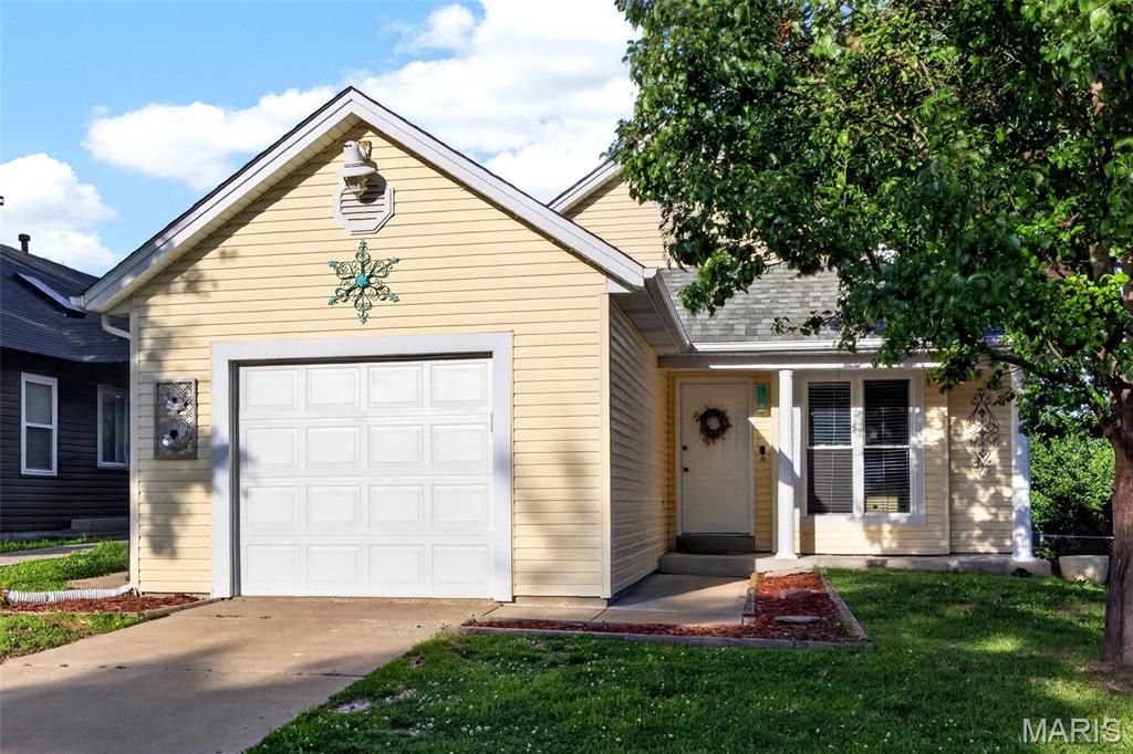 Welcome home to this charming, move-in ready 2-bedroom, 1.5-bath residence that has been lovingly maintained by the same owner for the past 26 years. From the moment you step inside, you'll appreciate the bright and inviting atmosphere, highlighted by soaring vaulted ceilings, fresh paint, and an electric fireplace that creates the perfect gathering space.

Designed for comfortable everyday living, the home features new carpet in the bedrooms and convenient main-floor laundry with a stackable washer and dryer. The kitchen comes complete with a refrigerator that stays, making your move even easier.

Enjoy peace of mind knowing that many of the home's major components have been updated within the last five years, including the roof, windows, air conditioner, water heater, and sump pump. These significant improvements provide lasting value and confidence for the next owner.

Step outside onto the back deck and unwind with a cold glass of iced tea while enjoying the peaceful surroundings. Conveniently located near Highways 364 and 94, this home offers easy access to shopping, dining, and everyday amenities while maintaining a warm neighborhood feel.

Whether you're a first-time homebuyer, looking to downsize, or searching for a well-cared-for property in a desirable location, this exceptional home is ready to welcome its next chapter. Don't miss your opportunity to make it yours!